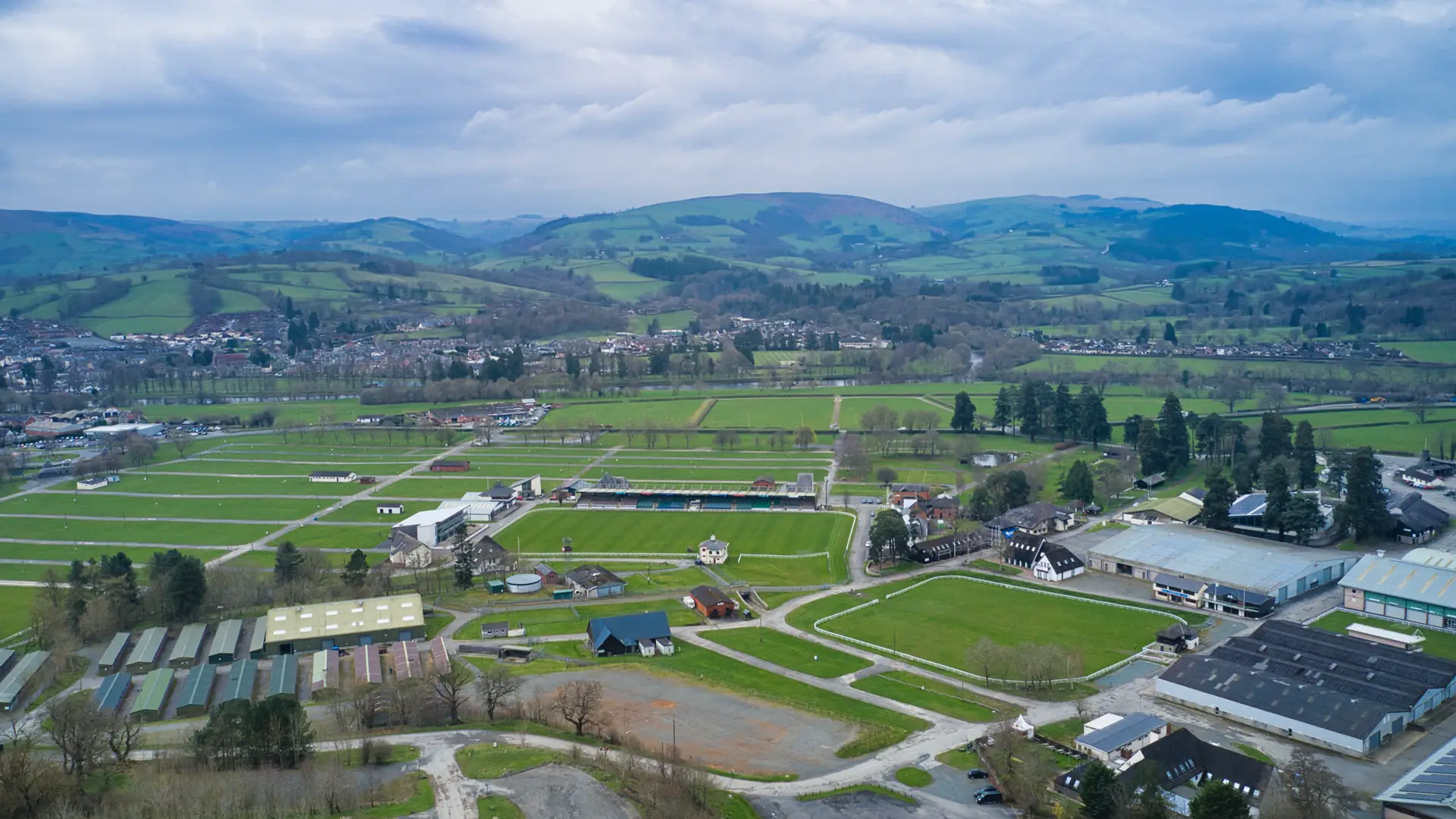 Drone view over the Royal Welsh Show showground and the hills of Wales